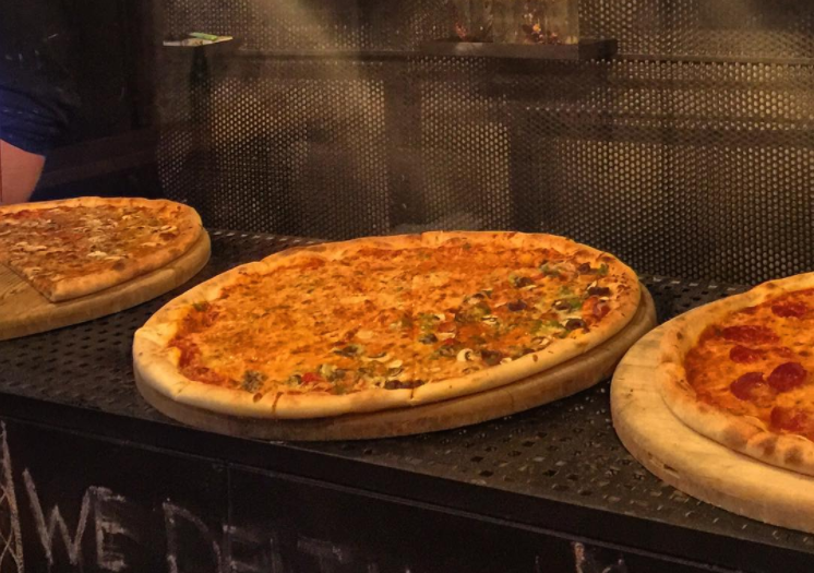 This AfterHours Pizza Joint Serves Pizza By The Slice