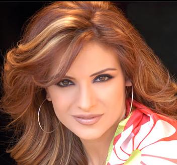 نوستالجيا الألفية: ٢٧ صورة مميزة للمذيعة هيلدا خليفة!